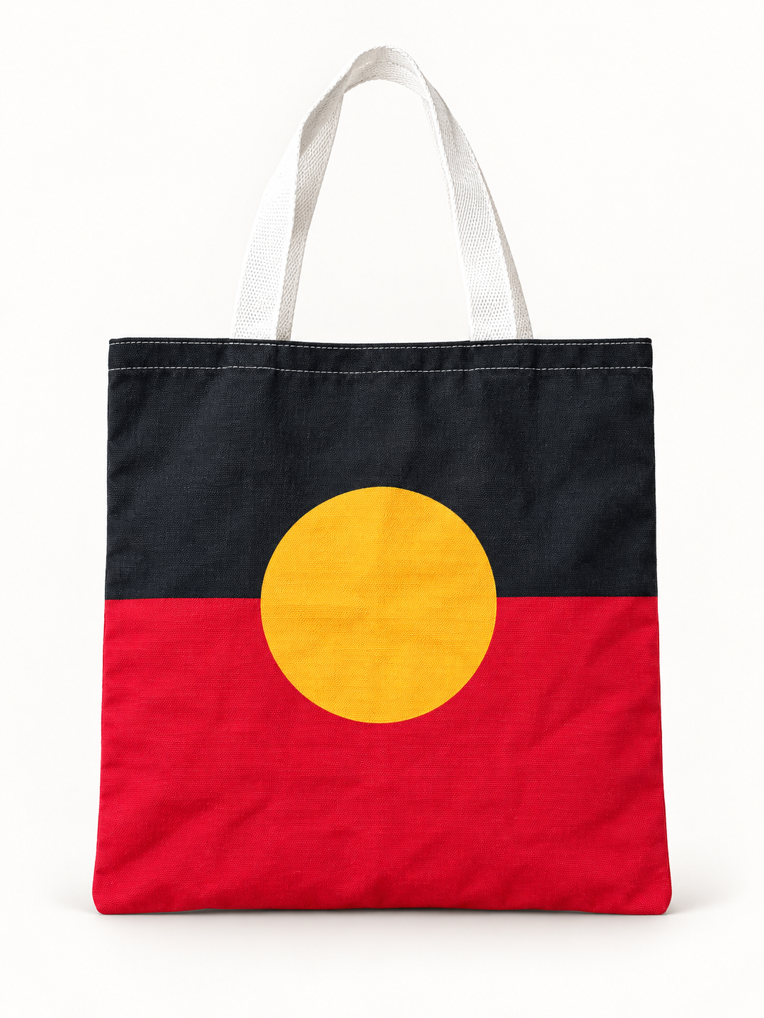 Aboriginal flag tote bag with white handles, front view