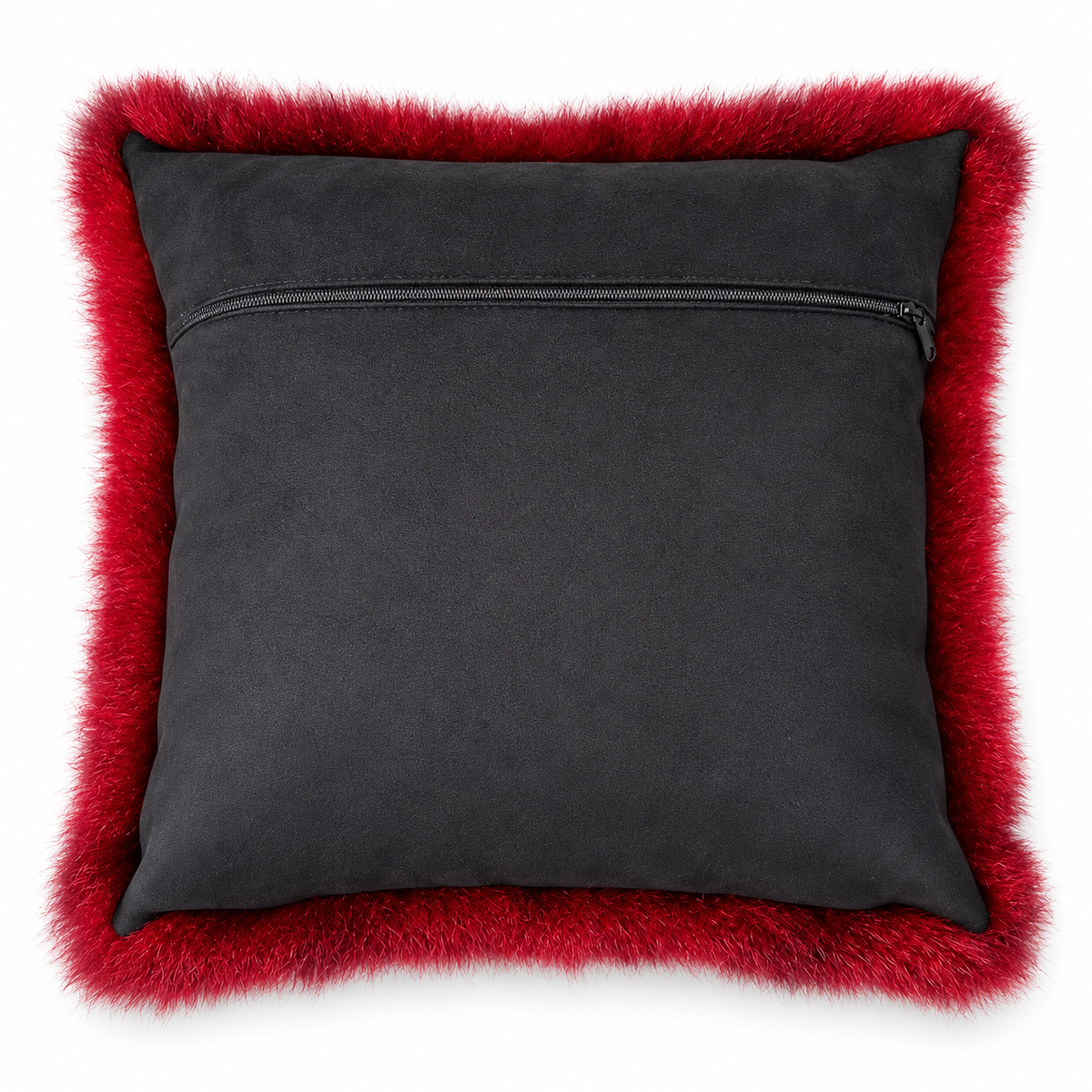 Reverse of dyed possum fur cushion showing black zip backing