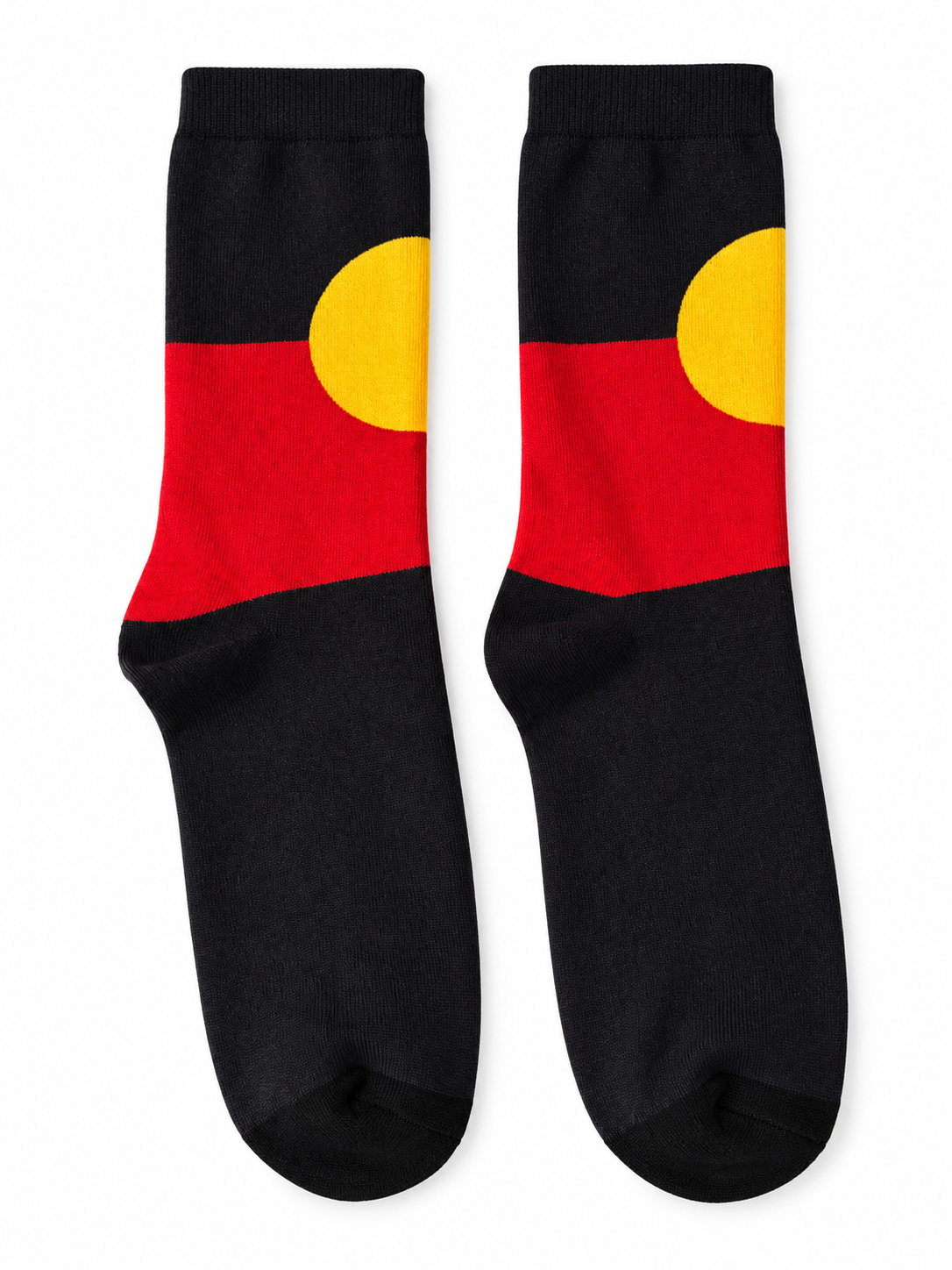 Pair of Aboriginal flag socks on a clean white background