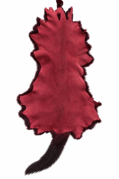 Dyed possum skin in Ruby, leather side