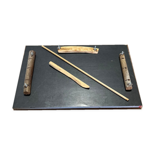 Friction board with wooden components on a white background