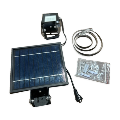 Flag pole solar panel light kit with panel, lamp, mounting clamps, cable and fixing hardware on a white background